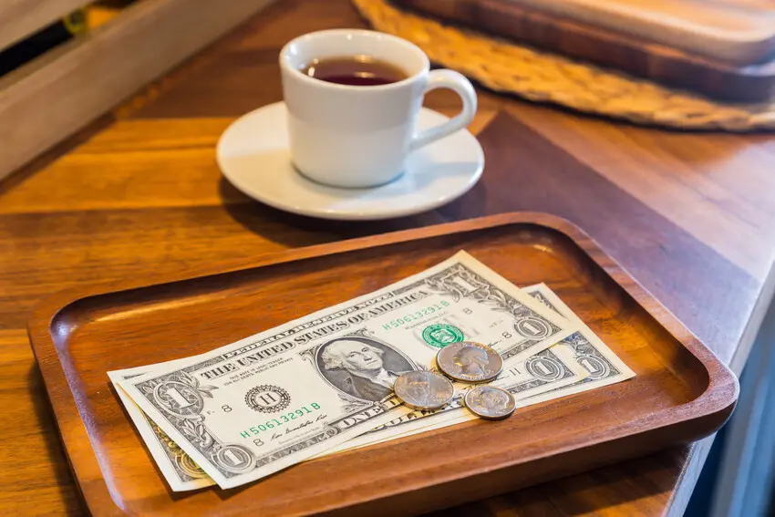 Navigating the Complexities of Tip Reporting and Service Charges: An In-Depth Look at IRS Regulations for the Service Industry